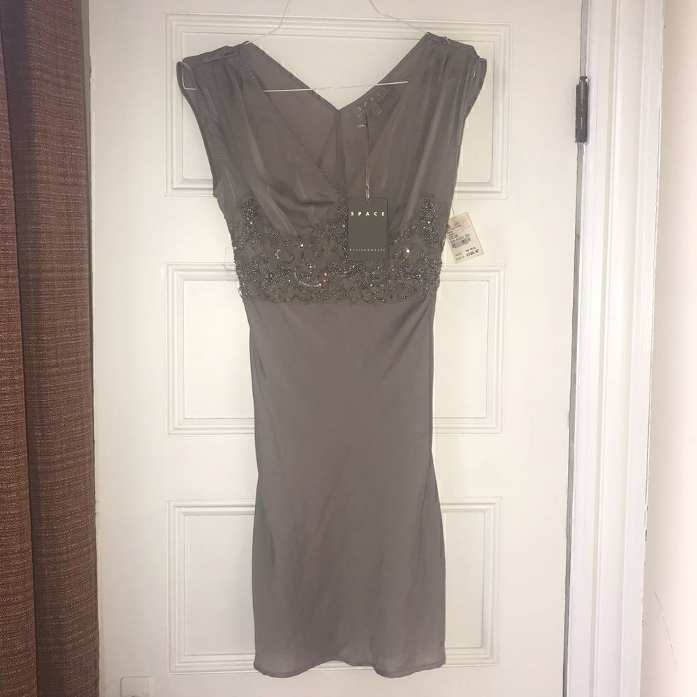 Space style concept designer dress size S